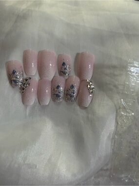 Blush pink press-on Nails. Glitter, Rhinestone accent. Coffin shape.
